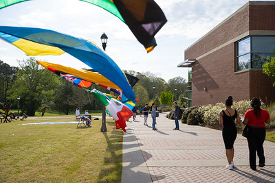 Flags from multiple countries waving in wind on-campus