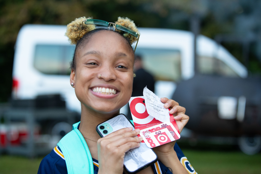 female student smiling outside