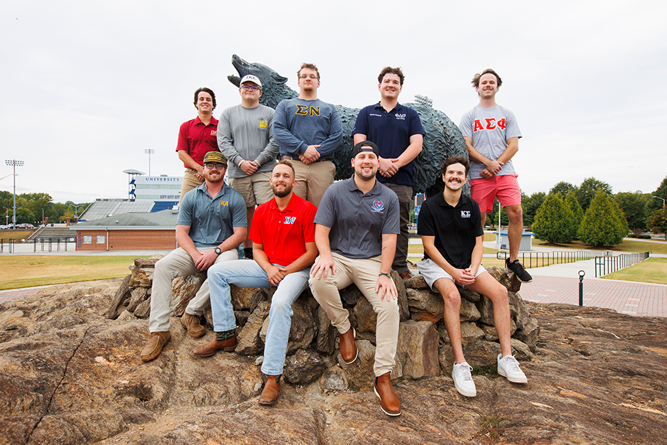 fraternity and sorority students in greek village