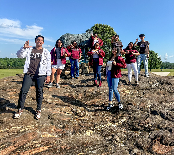 fraternity and sorority students in greek village