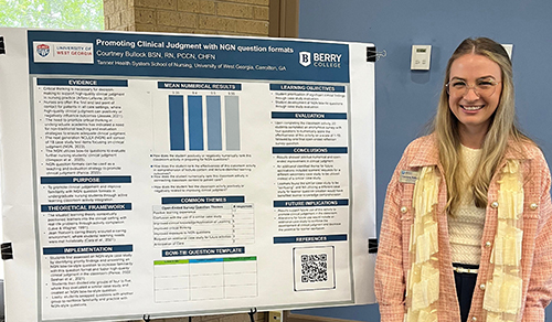 MSN student presenting research with poster