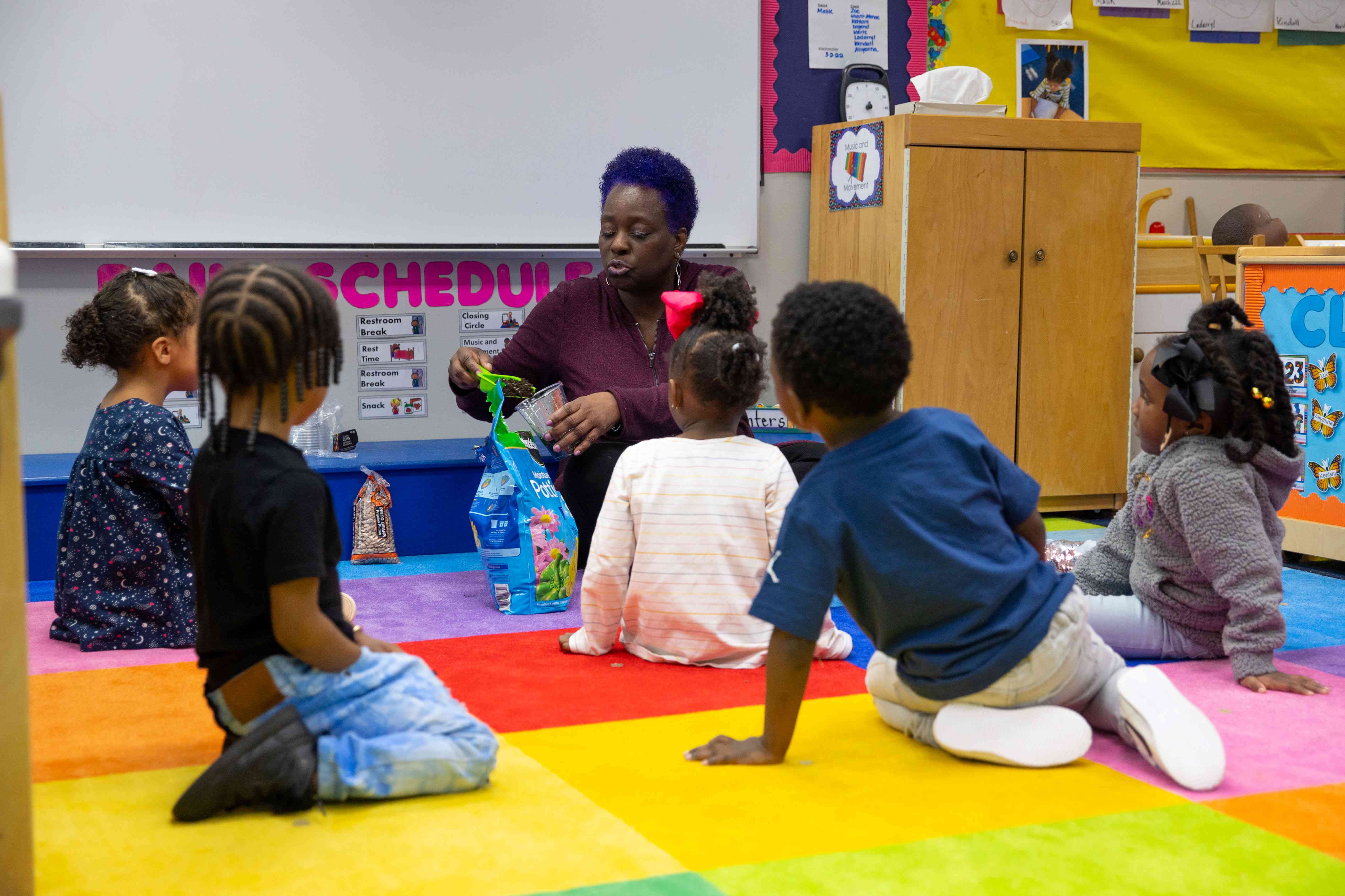 Teacher with students