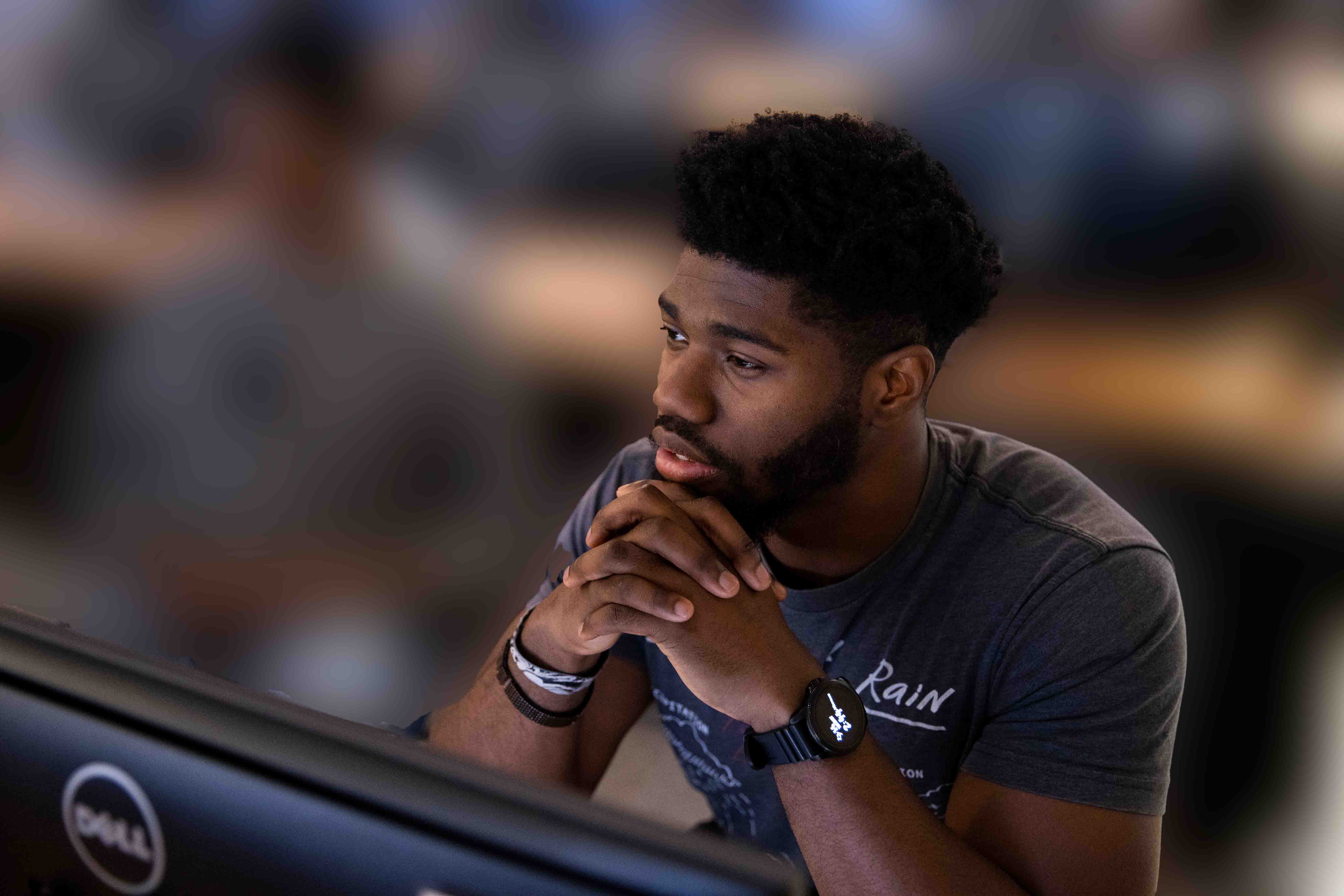 A guy sitting at a computer