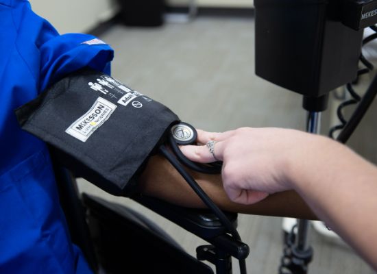 students taking blood pressure