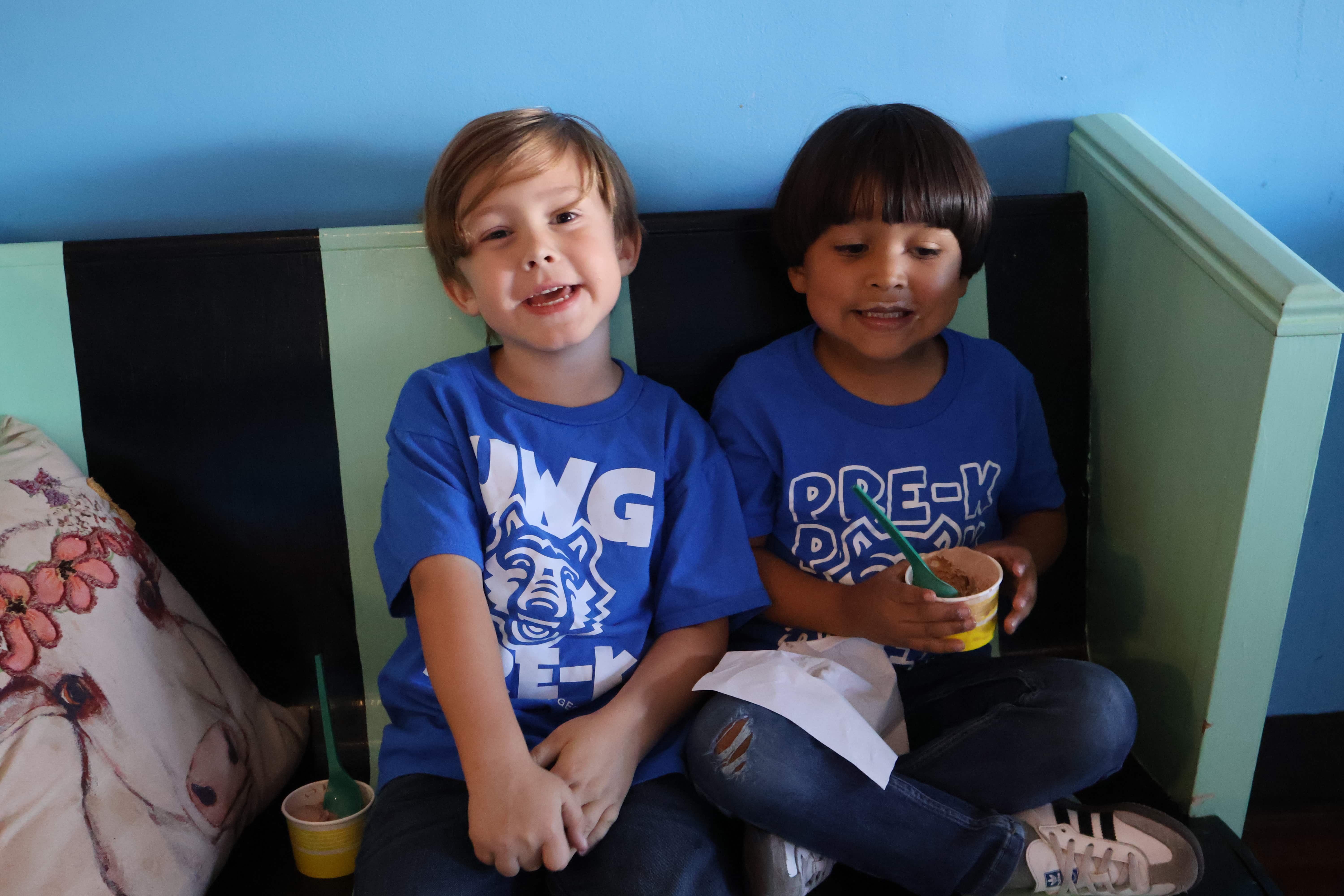 Pre-K students eating ice cream at the local ice cream shop Butter'd Utter. They are on a school field trip.