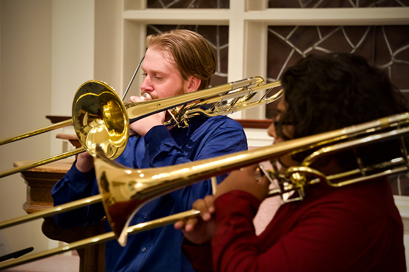 person playing trombone