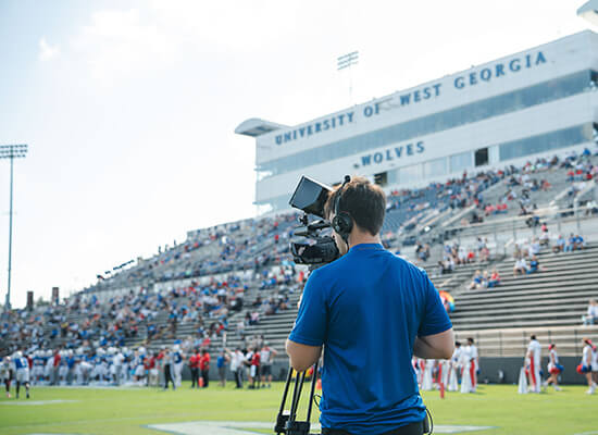 UWG Productions student filming a game