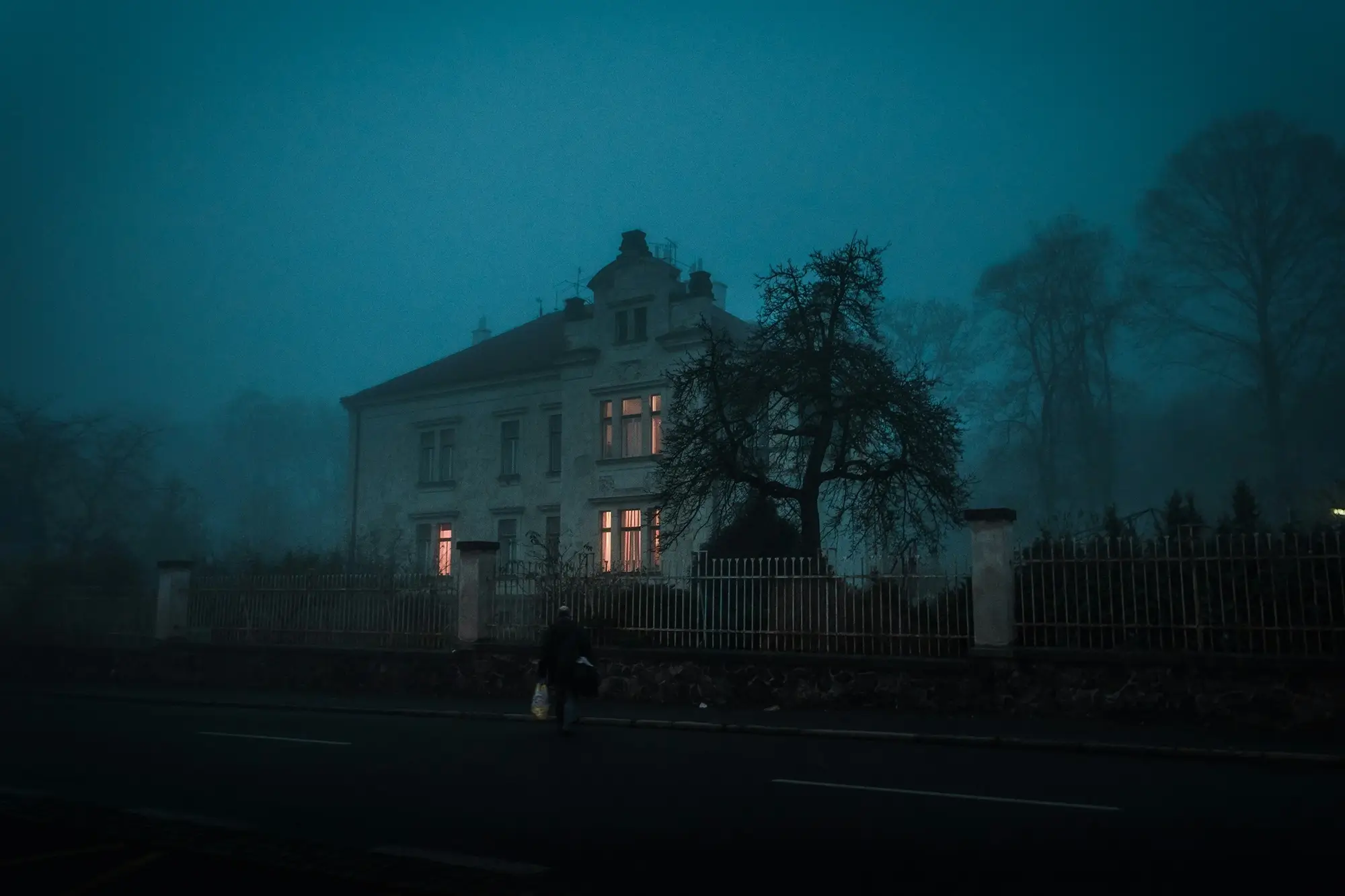 A creepy old house at night.