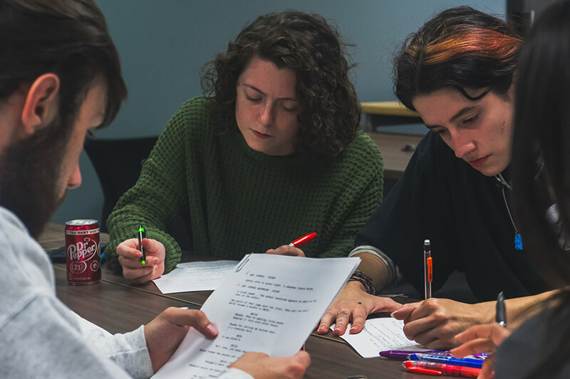 UWG film students working on a script