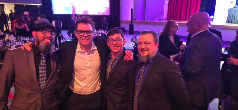 L to R: Shawn Isaacs, WOLF general manager; Bobby Bones, host of the nationally syndicated The Bobby Bones Show; Jason Barker, WOLF Sports Wolf-In-Training Program coordinator; and Michael Tucker, WOLF Radio operations manager