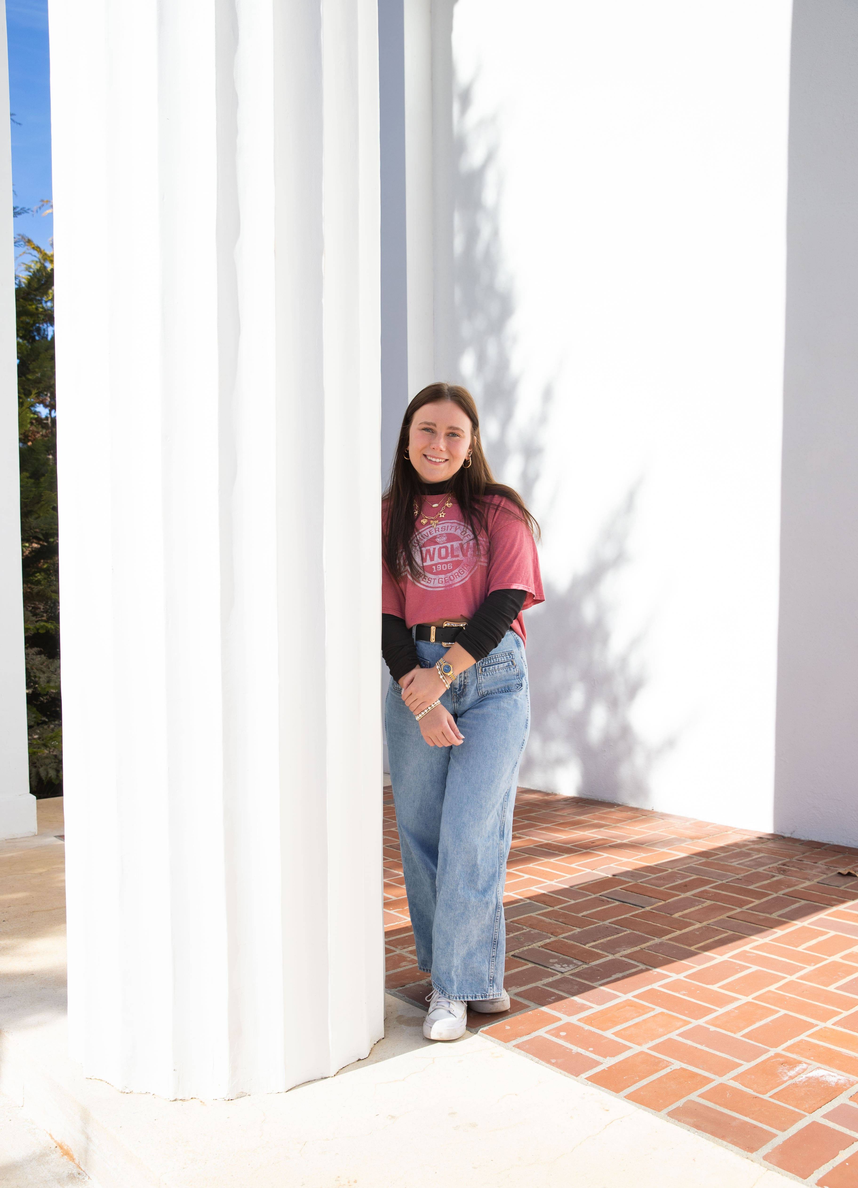 Grace Katherine James posing for an outside portait in her favorite UWG outfit!