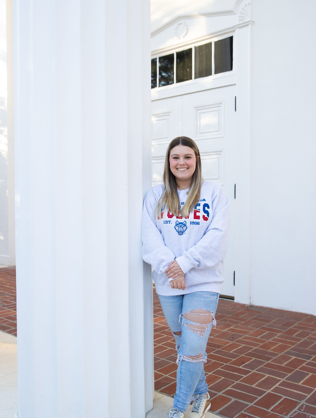 Jayra Stansell posing outside in her UWG attire!