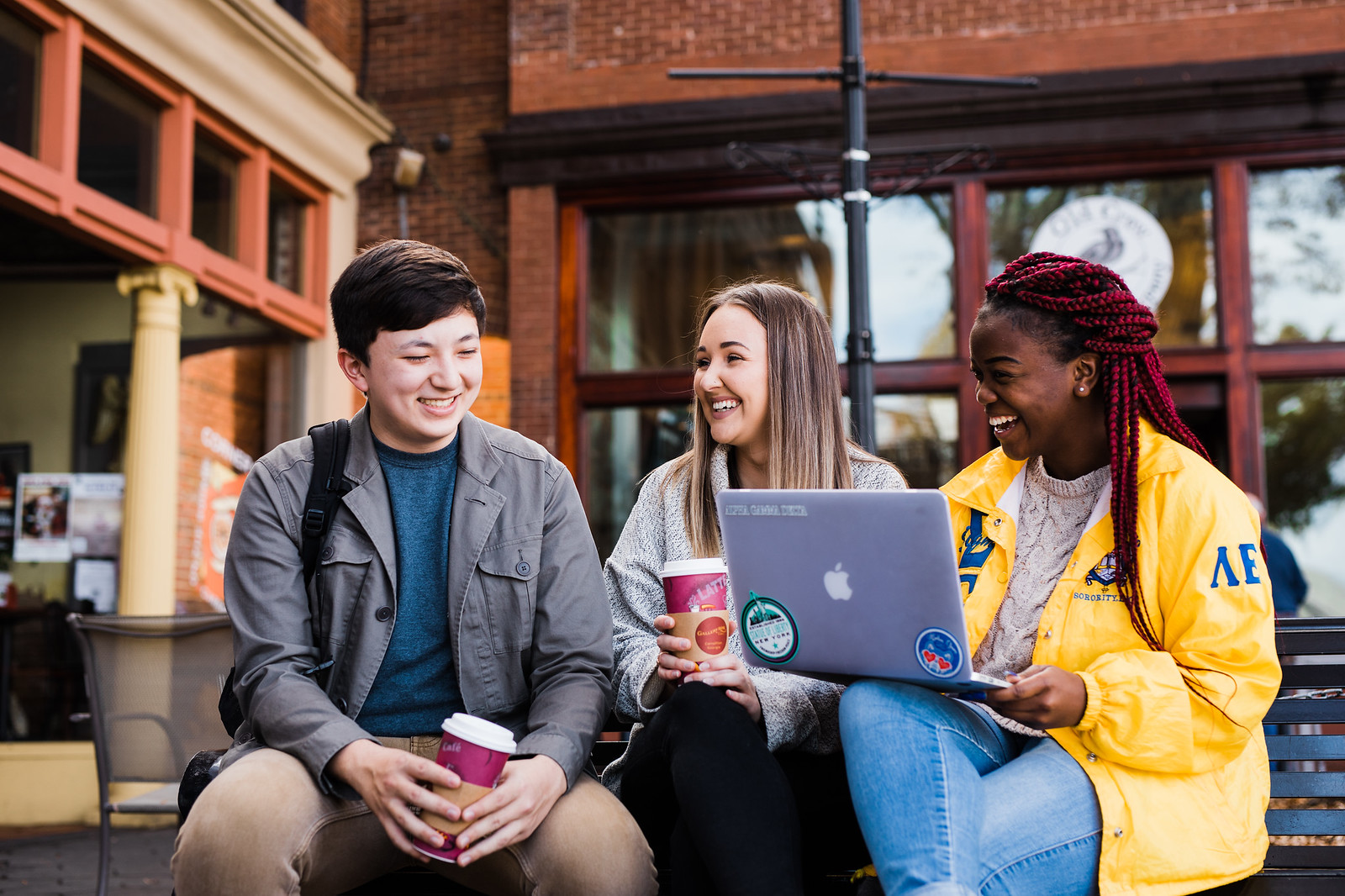 Three students having coffee