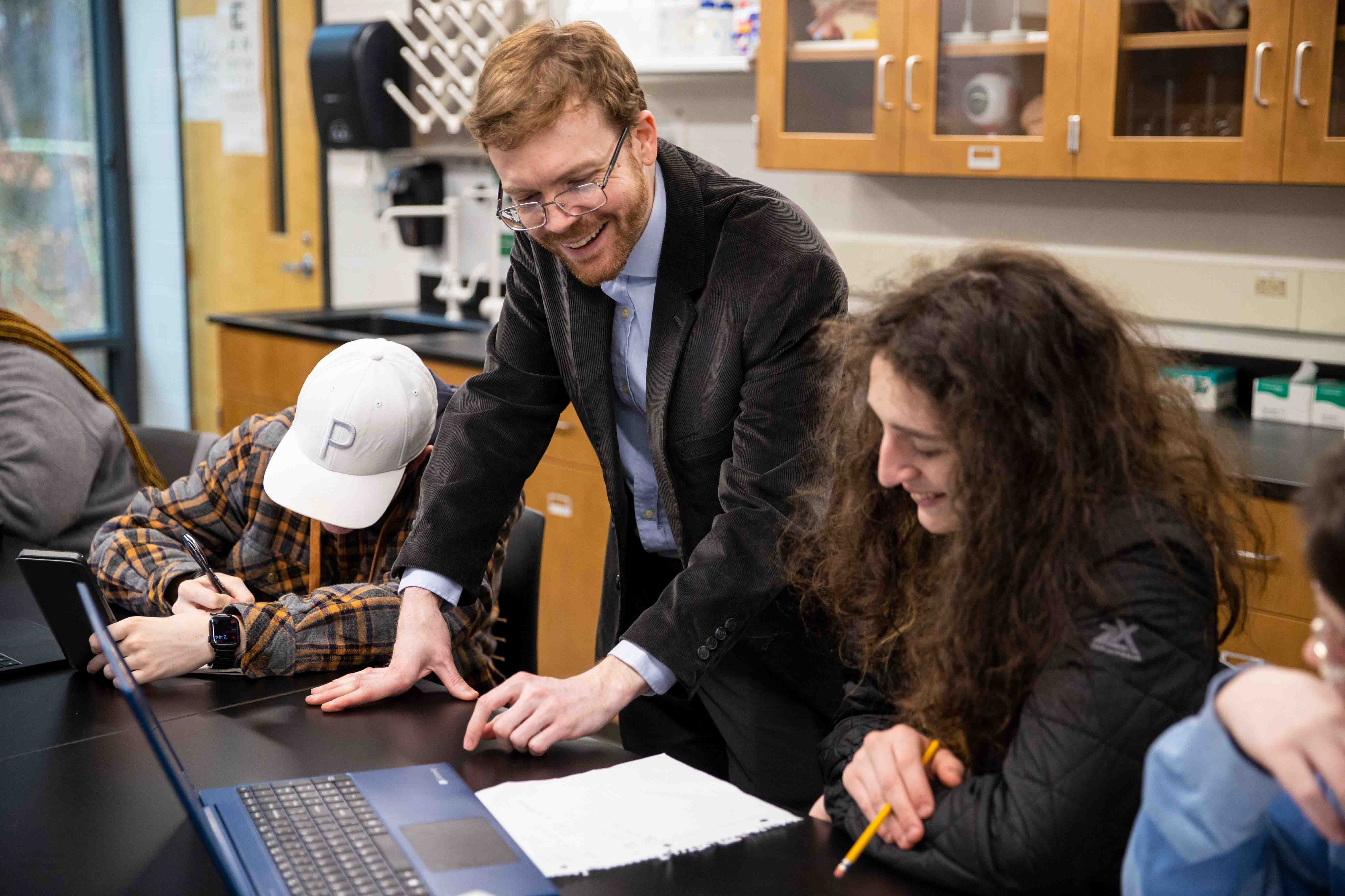 A professor working with a student